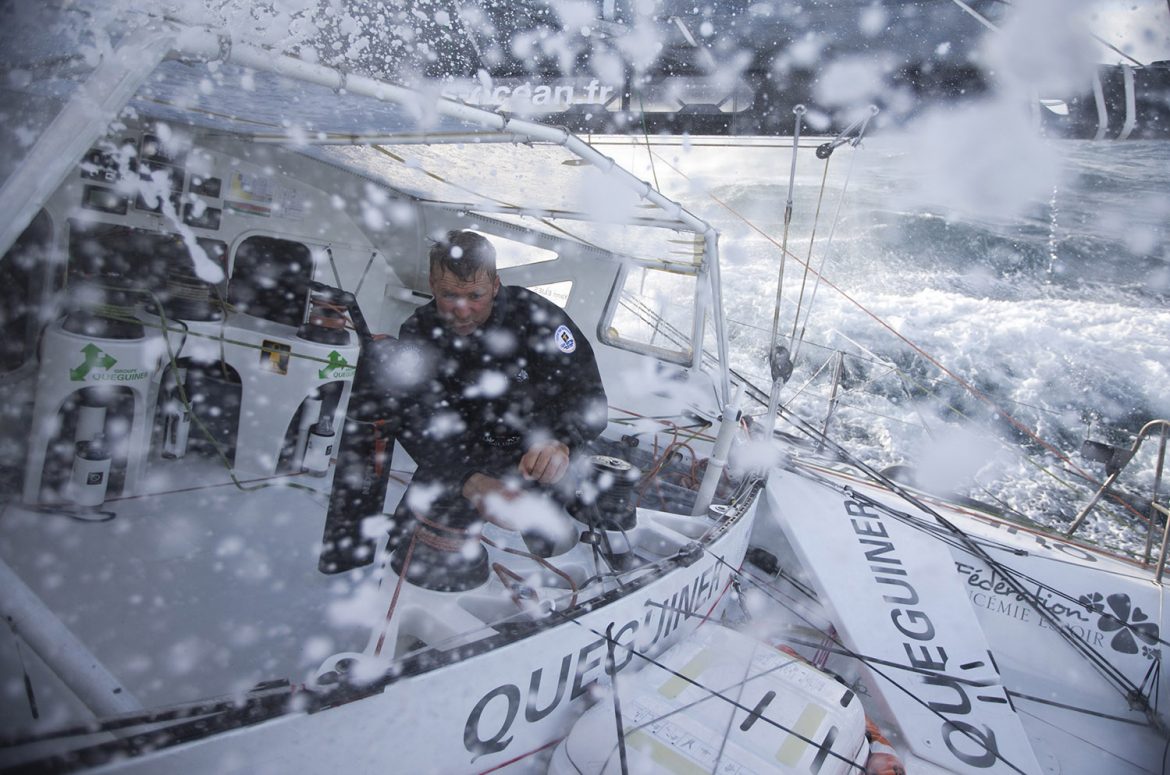 Sailing the Vendée Globe makes for a wet 80 days. Yann Elies skipper of Queguiner - Leucemie Espoir training solo prior to the start. Photo: Alexis Courcoux/Queguiner 